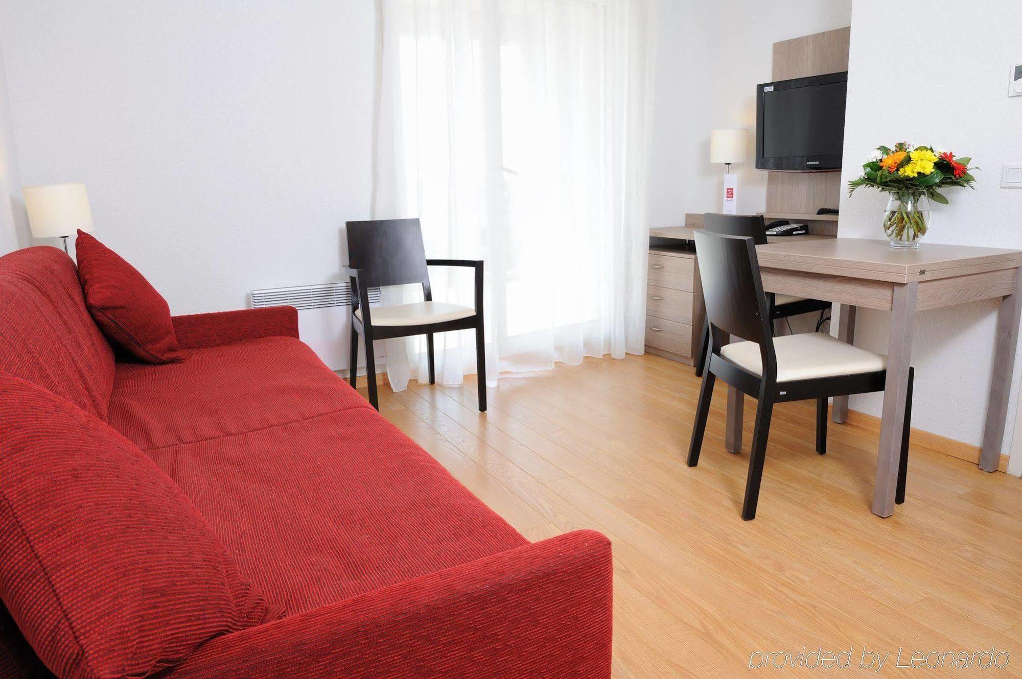Sejours & Affaires Geneve Gex Les Rives Du Leman Aparthotel Rom bilde